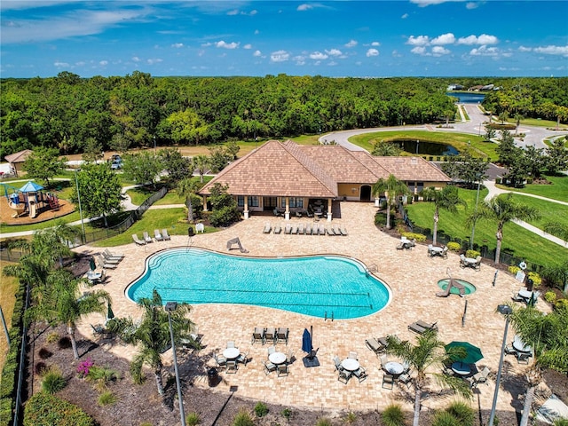 12841 Balsam Ter, Bradenton, FL 34212 - community pool with a patio area and a forest view