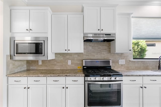 kitchen featuring white cabinetry, stainless steel appliances, and under cabinet range hood