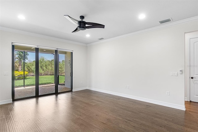 unfurnished room featuring a ceiling fan, ornamental molding, visible vents, dark wood-style flooring, and baseboards