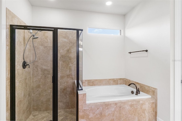 full bath with a shower stall and a bath