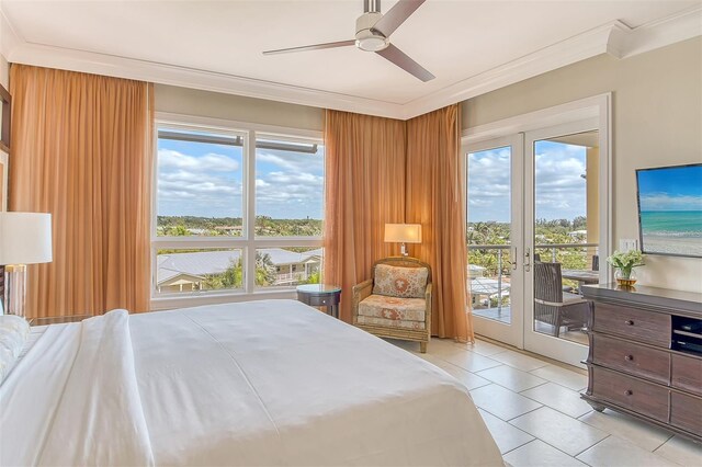 bedroom with french doors, crown molding, and access to outside