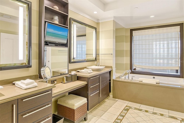 full bath featuring tile patterned flooring, vanity, recessed lighting, ornamental molding, and a garden tub