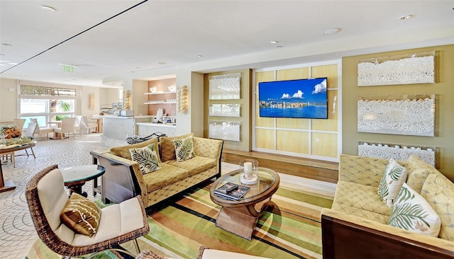 living area featuring recessed lighting