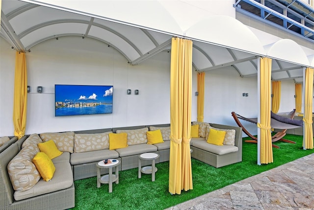 exterior space featuring an outdoor hangout area