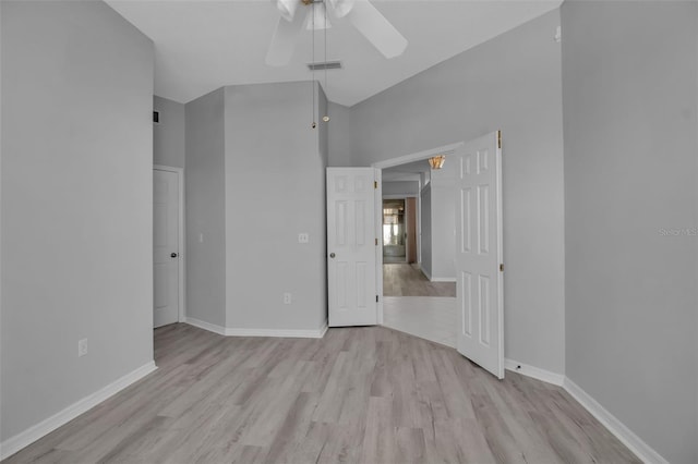 unfurnished bedroom with ceiling fan, baseboards, light wood finished floors, and visible vents