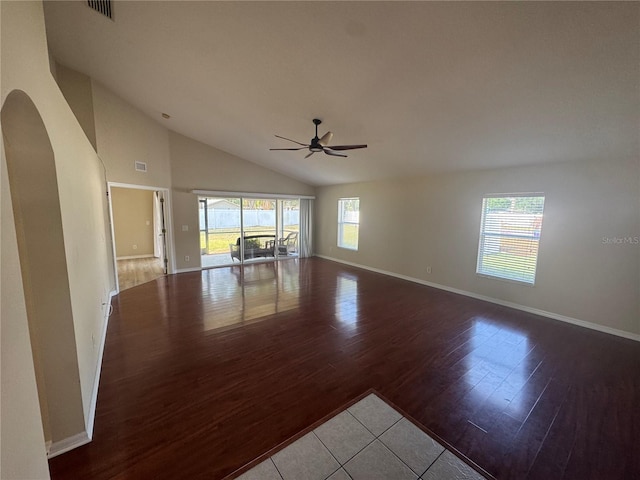 11811 53rd Ct E, Parrish, FL 34219 - spare room with baseboards, arched walkways, visible vents, ceiling fan, and wood finished floors