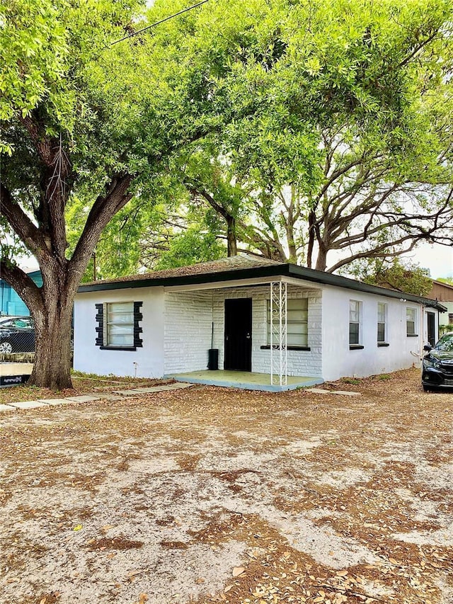 view of front of property with brick siding