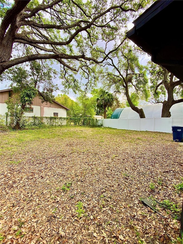 view of yard featuring fence