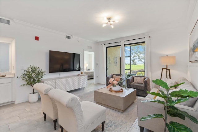 living area featuring visible vents, crown molding, and light tile patterned floors