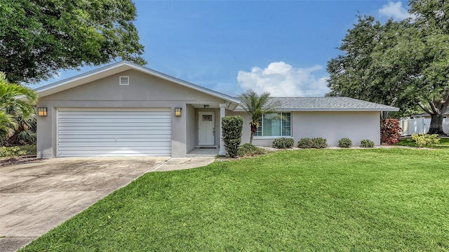single story home featuring stucco siding, a front lawn, concrete driveway, and an attached garage