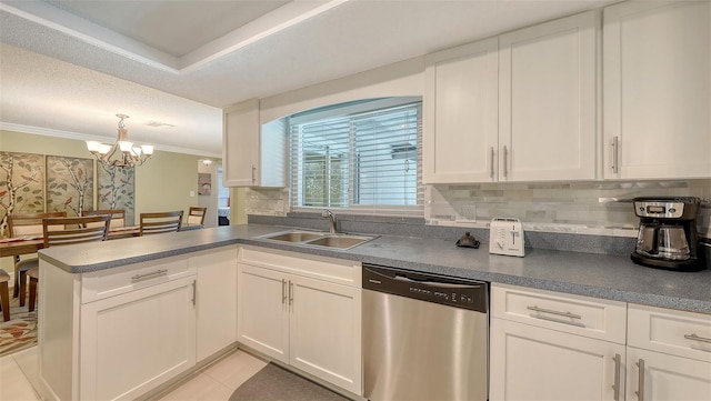 kitchen with white cabinetry, stainless steel dishwasher, crown molding, and a sink