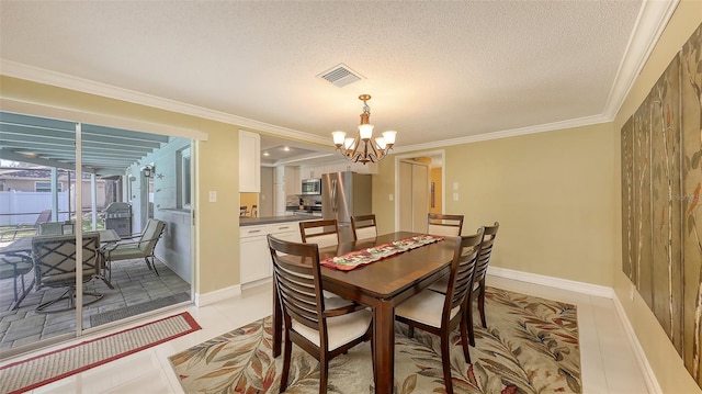 dining room featuring ornamental molding, a notable chandelier, visible vents, and light tile patterned floors