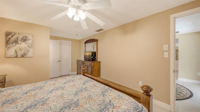 bedroom with visible vents, ceiling fan, and baseboards