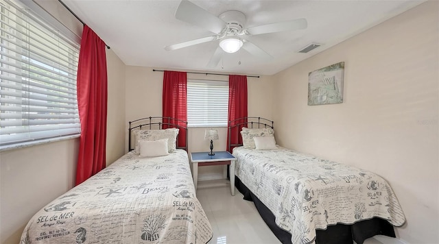 bedroom featuring visible vents and a ceiling fan