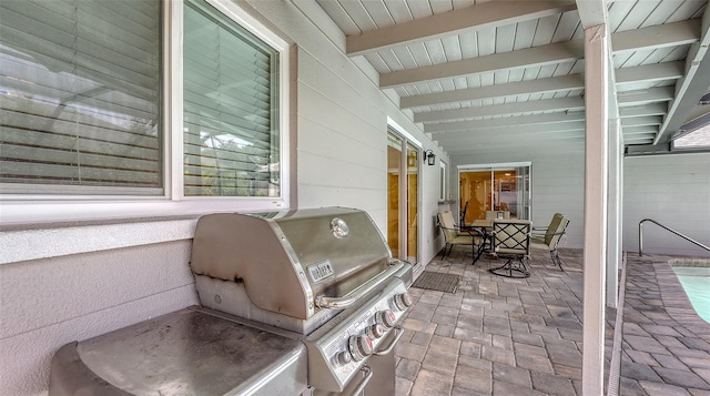 view of patio featuring outdoor dining space and grilling area