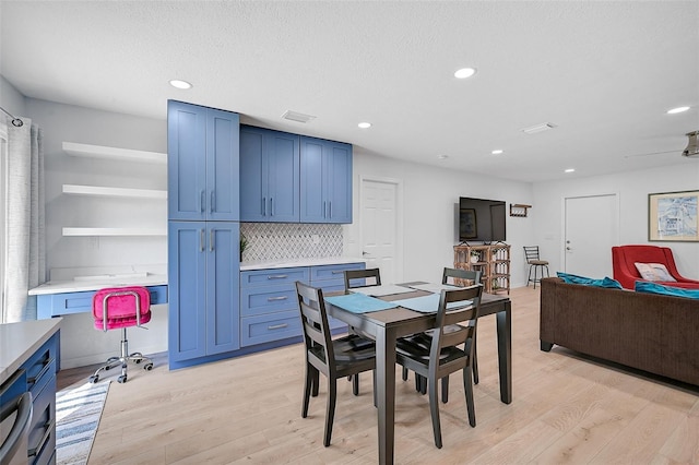 dining room with recessed lighting, visible vents, and light wood-style flooring