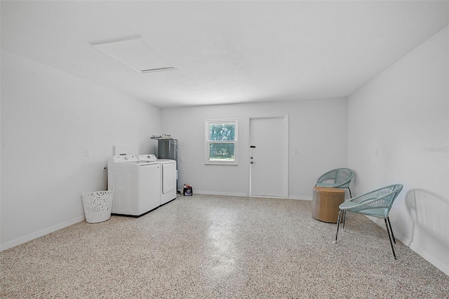 laundry area featuring independent washer and dryer, laundry area, baseboards, and attic access