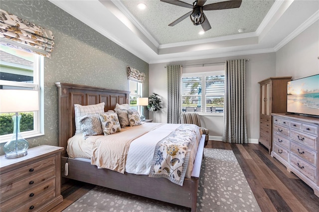 4625 Foxtail Dr, Parrish, FL 34219 - bedroom featuring dark wood finished floors, a raised ceiling, multiple windows, ornamental molding, and ceiling fan