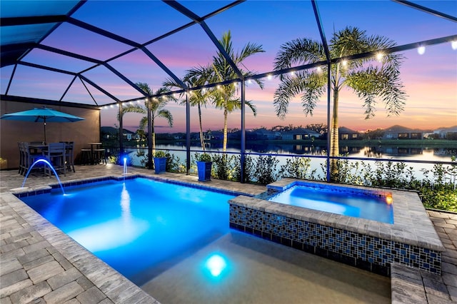 4625 Foxtail Dr, Parrish, FL 34219 - swimming pool with an in-ground hot tub, a patio, a water view, and a lanai