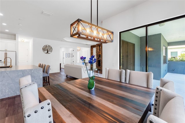 4308 Fly Rod Ter, Parrish, FL 34219 - dining room with recessed lighting, visible vents, and dark wood-type flooring