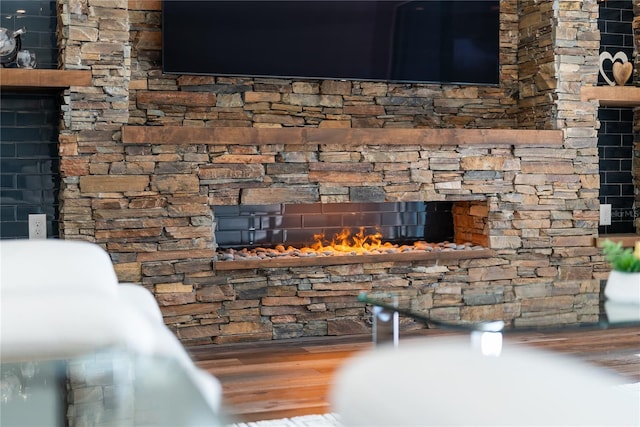 4308 Fly Rod Ter, Parrish, FL 34219 - interior details featuring a stone fireplace and wood finished floors