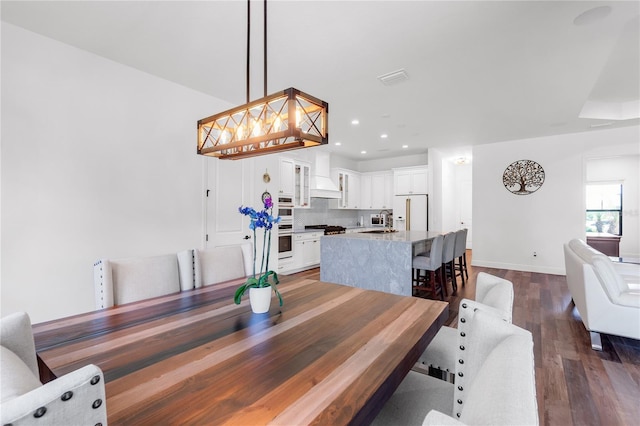 4308 Fly Rod Ter, Parrish, FL 34219 - dining space with baseboards, visible vents, recessed lighting, and dark wood-type flooring