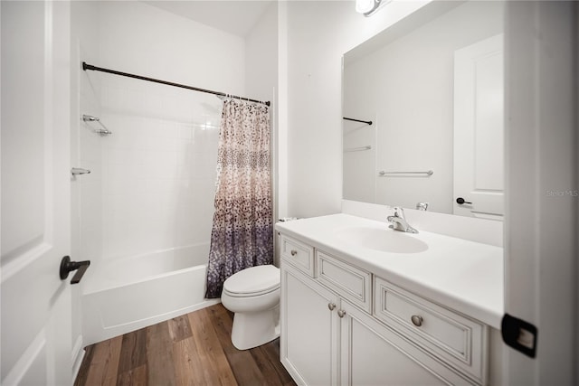 4308 Fly Rod Ter, Parrish, FL 34219 - full bath with toilet, shower / bathtub combination with curtain, wood finished floors, and vanity