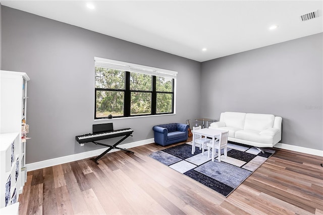 4308 Fly Rod Ter, Parrish, FL 34219 - sitting room featuring visible vents, baseboards, and wood finished floors