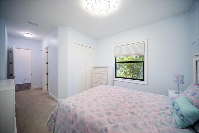 4308 Fly Rod Ter, Parrish, FL 34219 - carpeted bedroom featuring baseboards, visible vents, and a closet