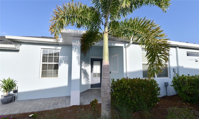 17817 Woodland Ct, Punta Gorda, FL 33982 - entrance to property with stucco siding