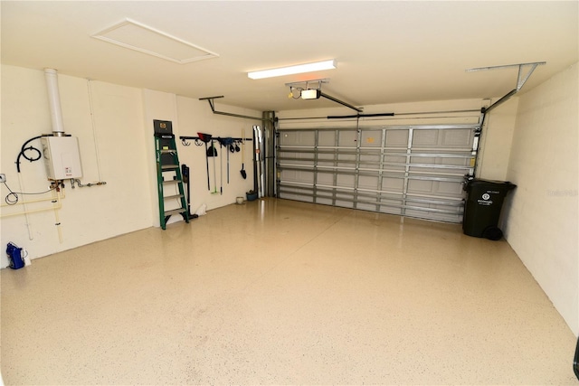 17817 Woodland Ct, Punta Gorda, FL 33982 - garage featuring a garage door opener and water heater