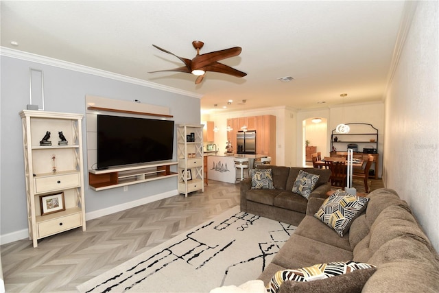 17817 Woodland Ct, Punta Gorda, FL 33982 - living room featuring ceiling fan, ornamental molding, and arched walkways