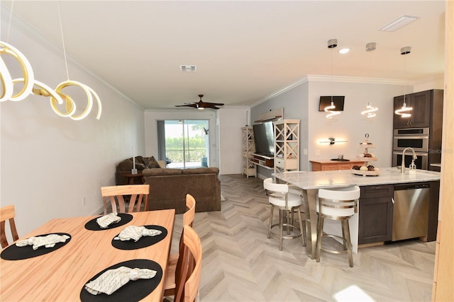 17817 Woodland Ct, Punta Gorda, FL 33982 - dining area with a ceiling fan and ornamental molding