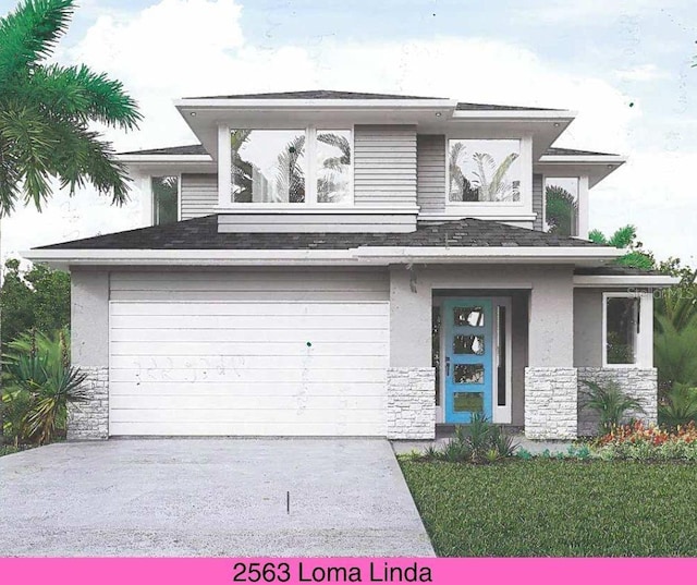 2563 Loma Linda St, Sarasota, FL 34239 - prairie-style home with stone siding, an attached garage, stucco siding, and driveway