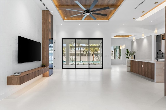 living room featuring a high ceiling, recessed lighting, wood ceiling, and ceiling fan