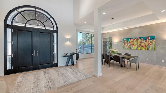 1540 Hillview Dr, Sarasota, FL 34239 - entryway with baseboards, a high ceiling, wood finished floors, and recessed lighting