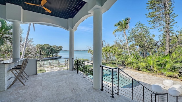 1540 Hillview Dr, Sarasota, FL 34239 - view of patio / terrace featuring a water view and a ceiling fan