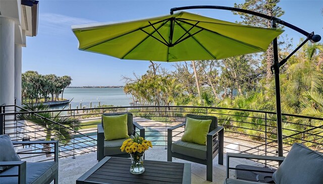 1540 Hillview Dr, Sarasota, FL 34239 - balcony featuring an outdoor living space and a water view