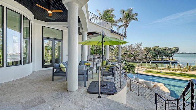 1540 Hillview Dr, Sarasota, FL 34239 - view of patio with a water view, french doors, and a ceiling fan