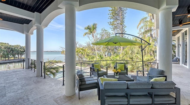 1540 Hillview Dr, Sarasota, FL 34239 - view of patio featuring an outdoor living space and a water view