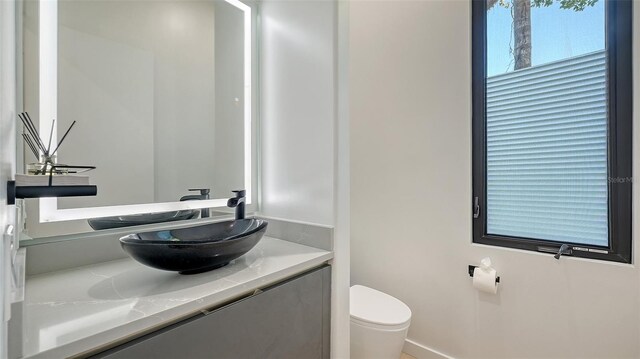 1540 Hillview Dr, Sarasota, FL 34239 - bathroom with toilet and vanity