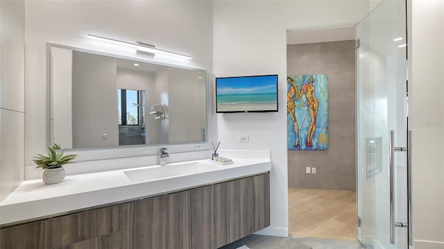 1540 Hillview Dr, Sarasota, FL 34239 - bathroom featuring vanity and wood finished floors