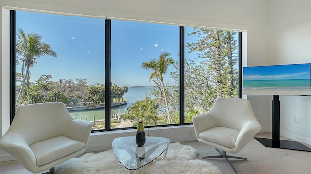 1540 Hillview Dr, Sarasota, FL 34239 - living area featuring wood finished floors and a healthy amount of sunlight