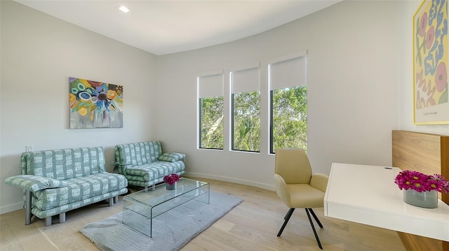 1540 Hillview Dr, Sarasota, FL 34239 - living area featuring baseboards and wood finished floors