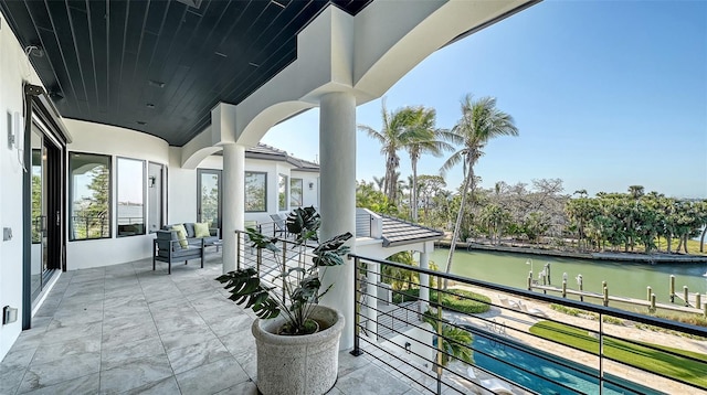 1540 Hillview Dr, Sarasota, FL 34239 - view of patio / terrace featuring a balcony and a water view