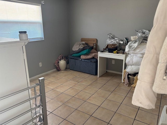 3255 51st Avenue Dr W, Bradenton, FL 34207 - bedroom with light tile patterned flooring and baseboards