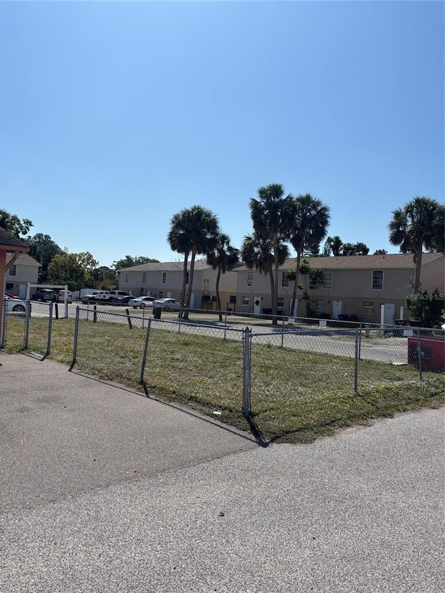 3255 51st Avenue Dr W, Bradenton, FL 34207 - exterior space with a front lawn and fence