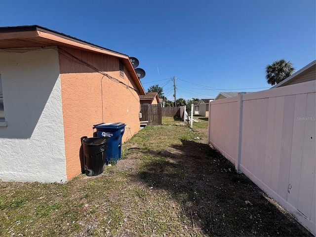 3255 51st Avenue Dr W, Bradenton, FL 34207 - view of home's exterior featuring stucco siding and fence