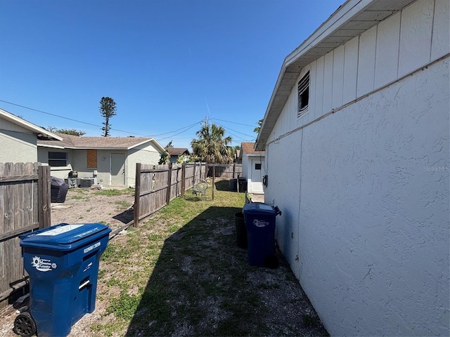 3265 51st Avenue Dr W, Bradenton, FL 34207 - view of yard with central air condition unit and fence