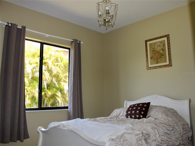 406 Petrel Trl, Bradenton, FL 34212 - bedroom featuring an inviting chandelier